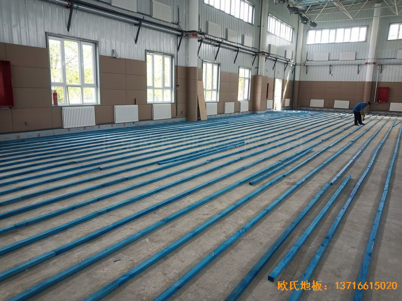 新疆克拉玛依市独山子虹园小区体育馆运动木地板安装案例