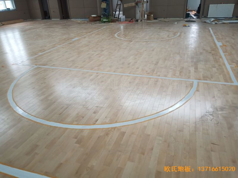 新疆克拉玛依市独山子虹园小区体育馆运动木地板安装案例
