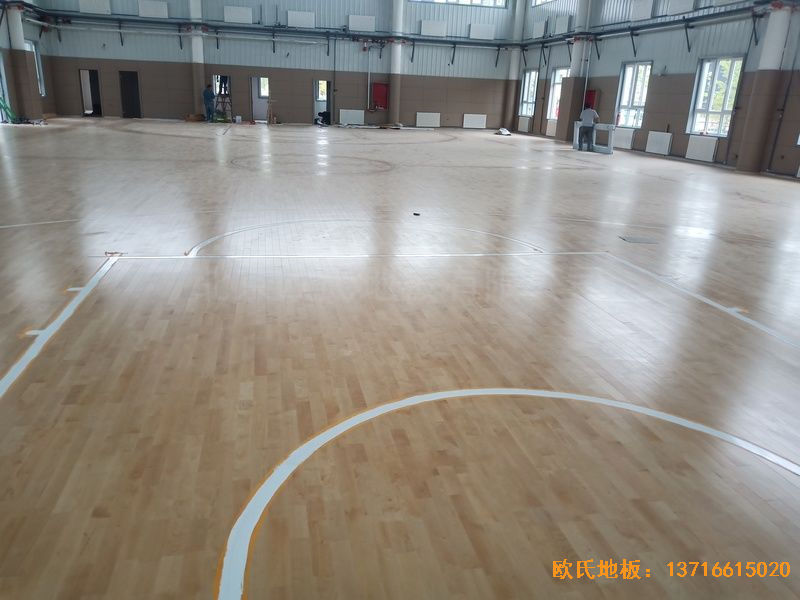 新疆克拉玛依市独山子虹园小区体育馆运动木地板安装案例