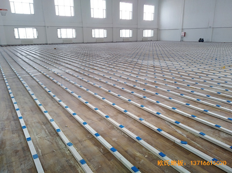新疆克拉玛依消防大队篮球馆运动木地板施工案例1