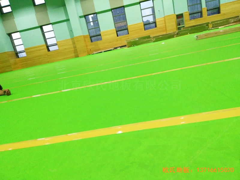 武汉广阜屯小学清江锦城分校篮球馆运动木地板施工案例3