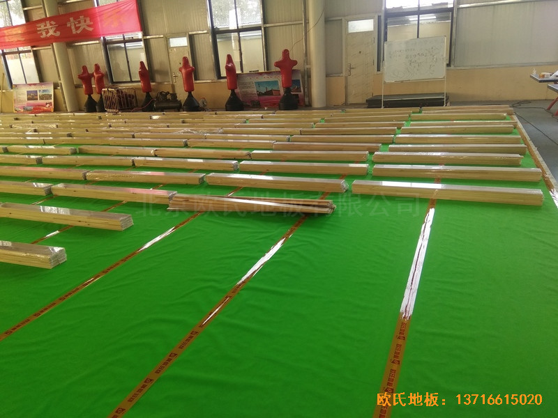 江苏虎腰村爱尔行业学校运动馆体育木地板施工案例3