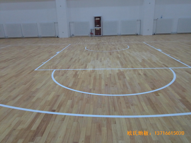 银川北师大银川小学篮球馆运动地板铺设案例4