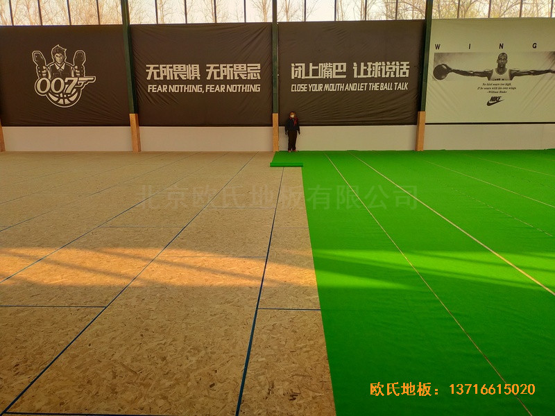 山东北环路平安行驾校篮球馆体育木地板铺装案例3