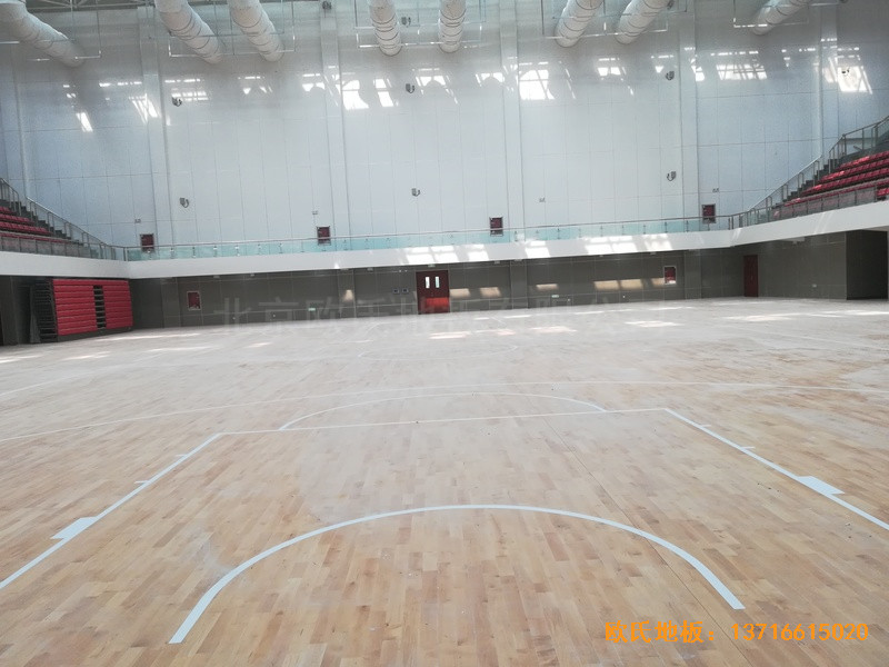 山东济南长清山东管理学院篮球馆运动木地板施工案例3